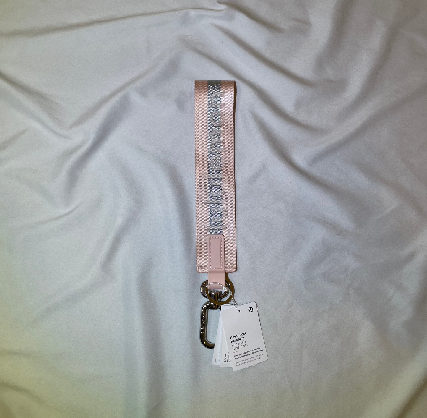NWT Never Lost Keychain Wordmark